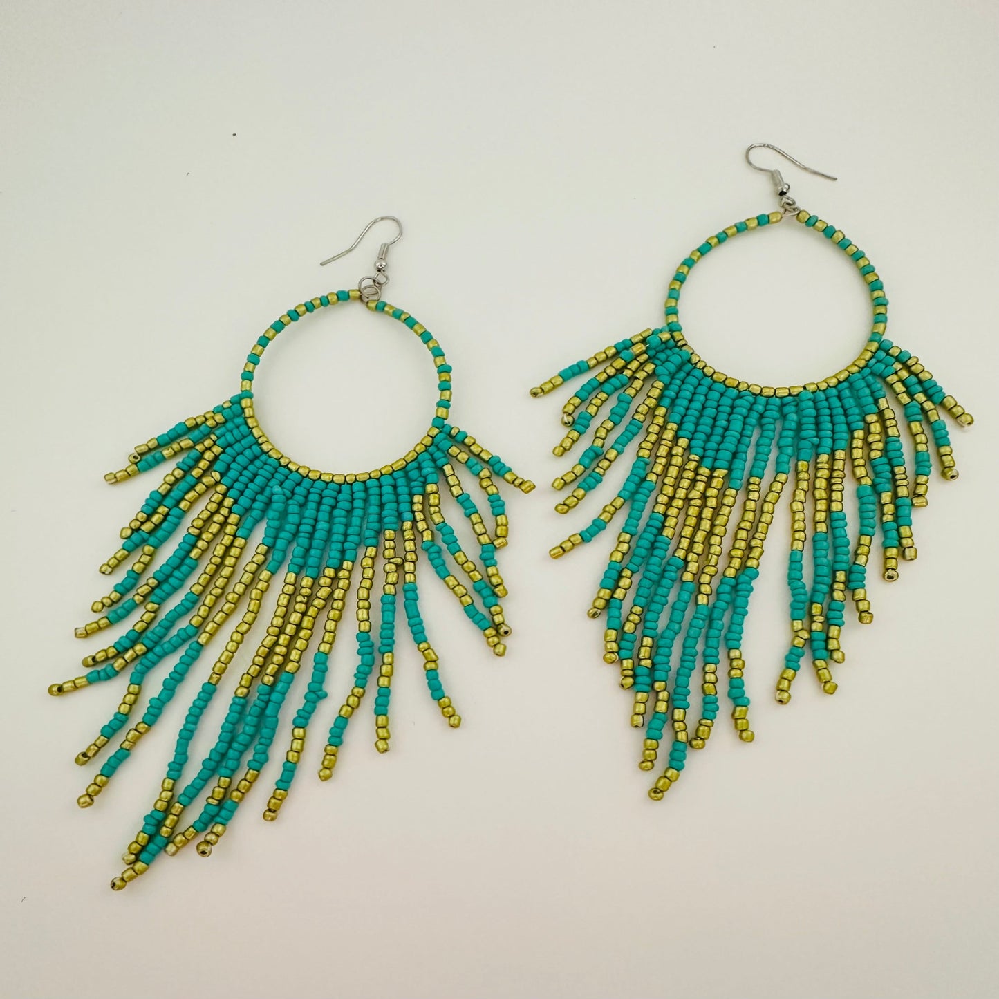 Beaded Blue fish hook earrings
5-1/2 inches length
1.06 oz