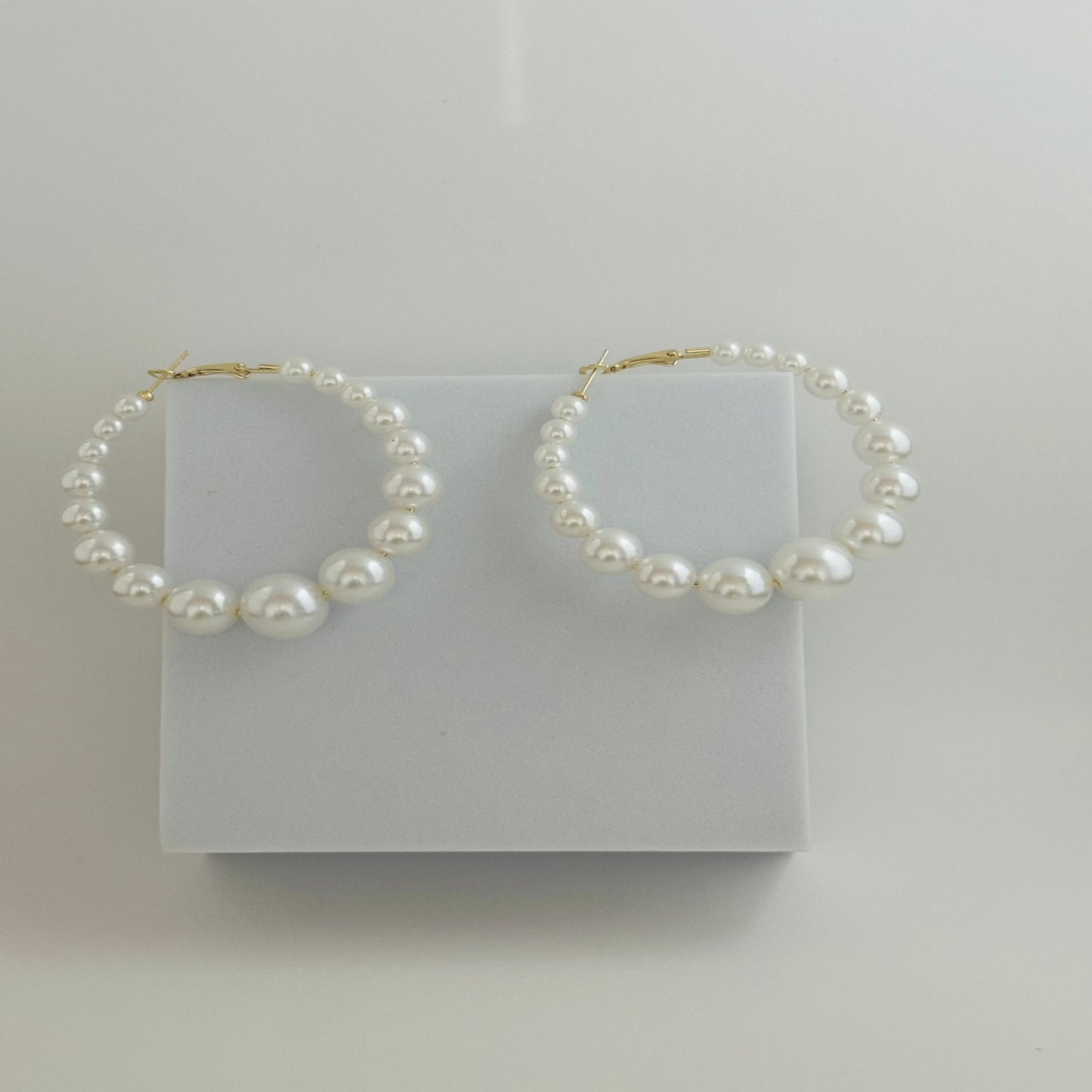 Pearl Hoop Earrings
Height 2.4 in
Width 2.36 in
Weight 0.741 oz