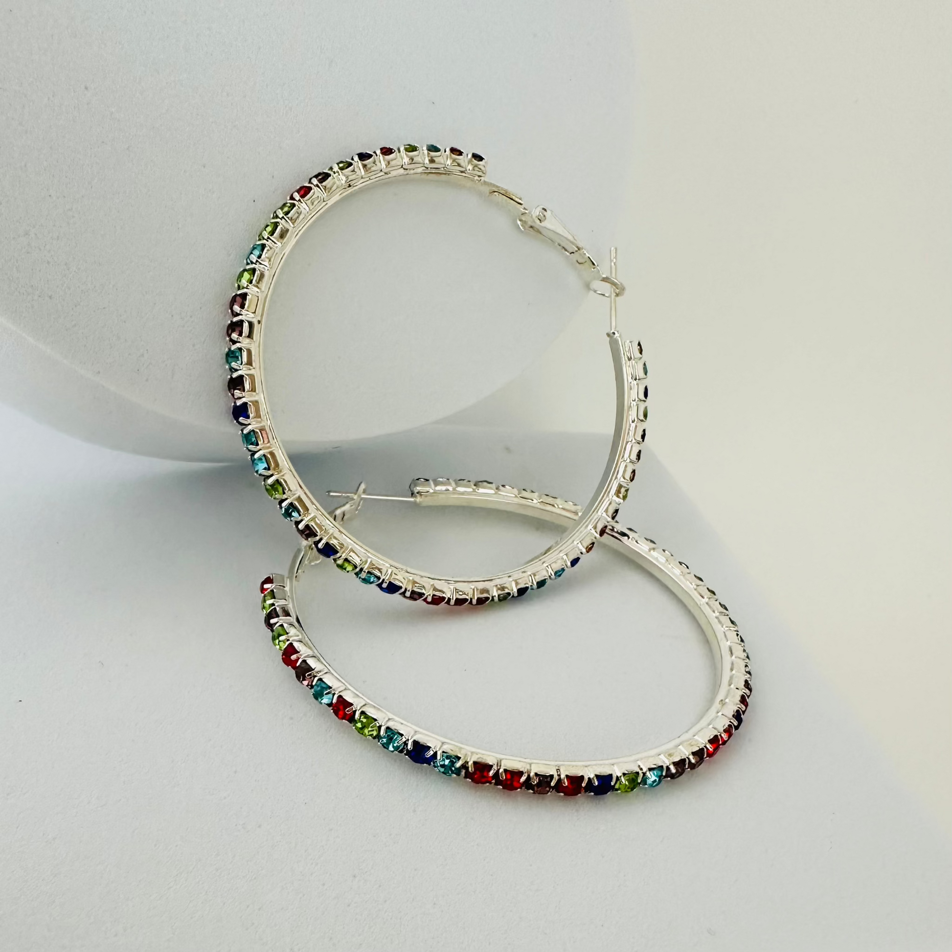 Silver colorful rhinestones hoop earring 2.9 Inches diameter 
0.41 oz.