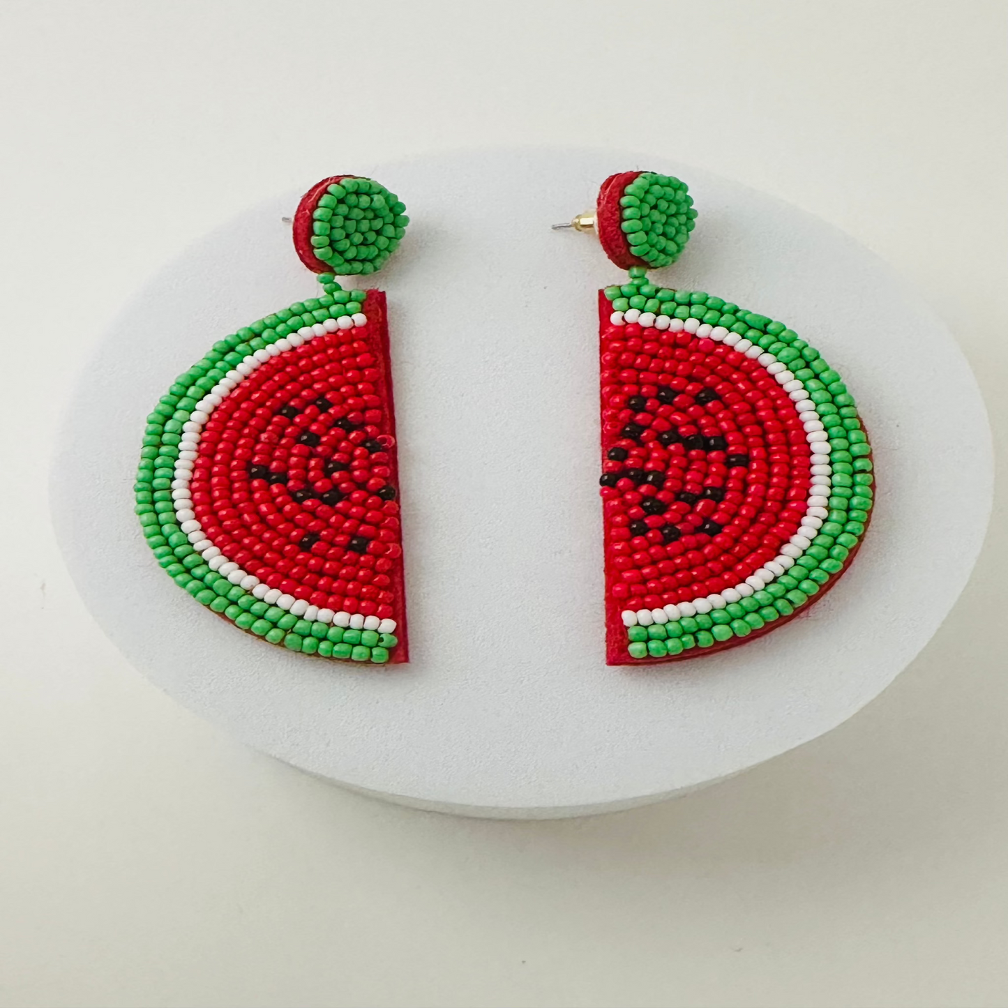 Green, red and white drop earrings 