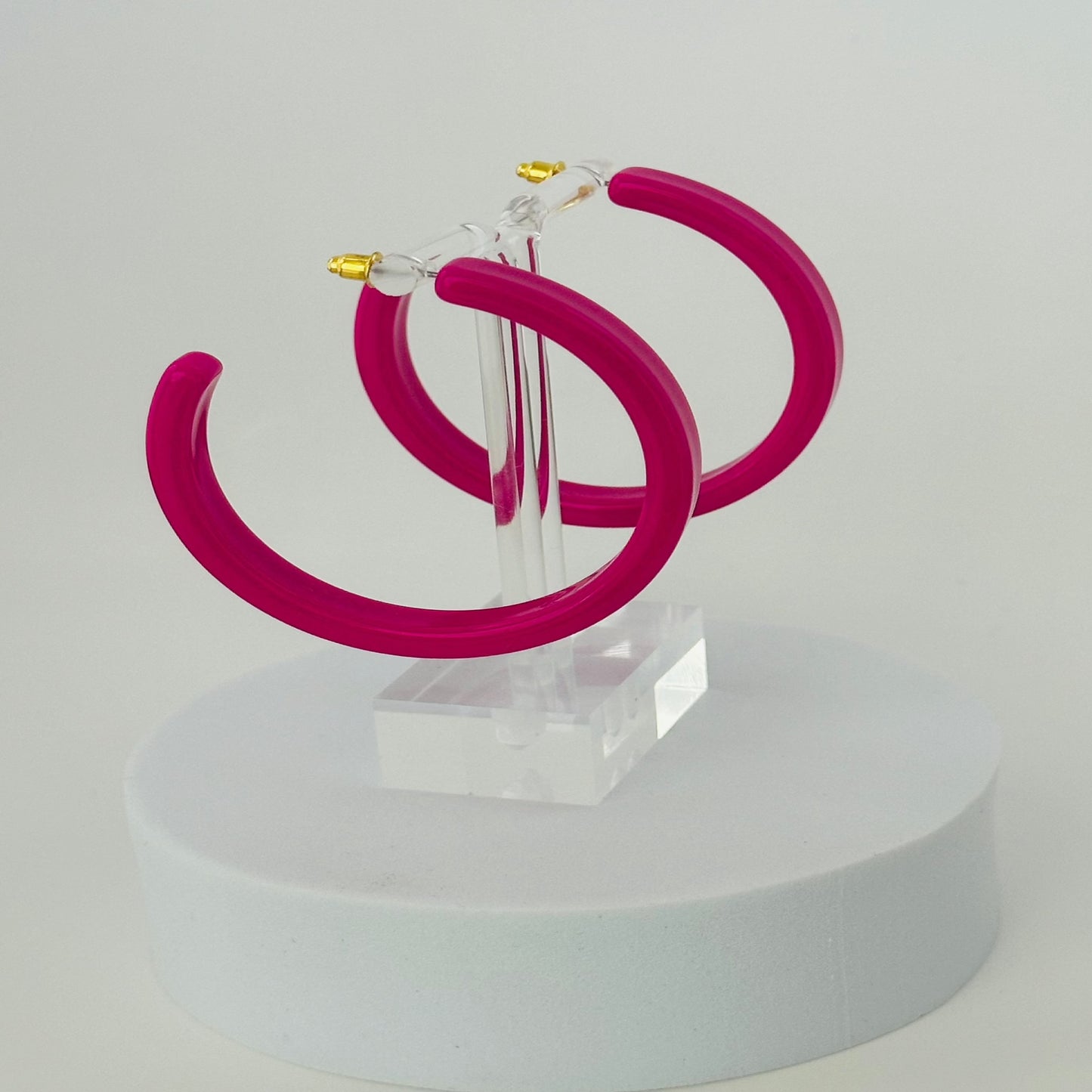 Pink Acrylic hoop earrings .423oz
2.205 inches length
0.354 inches wide
