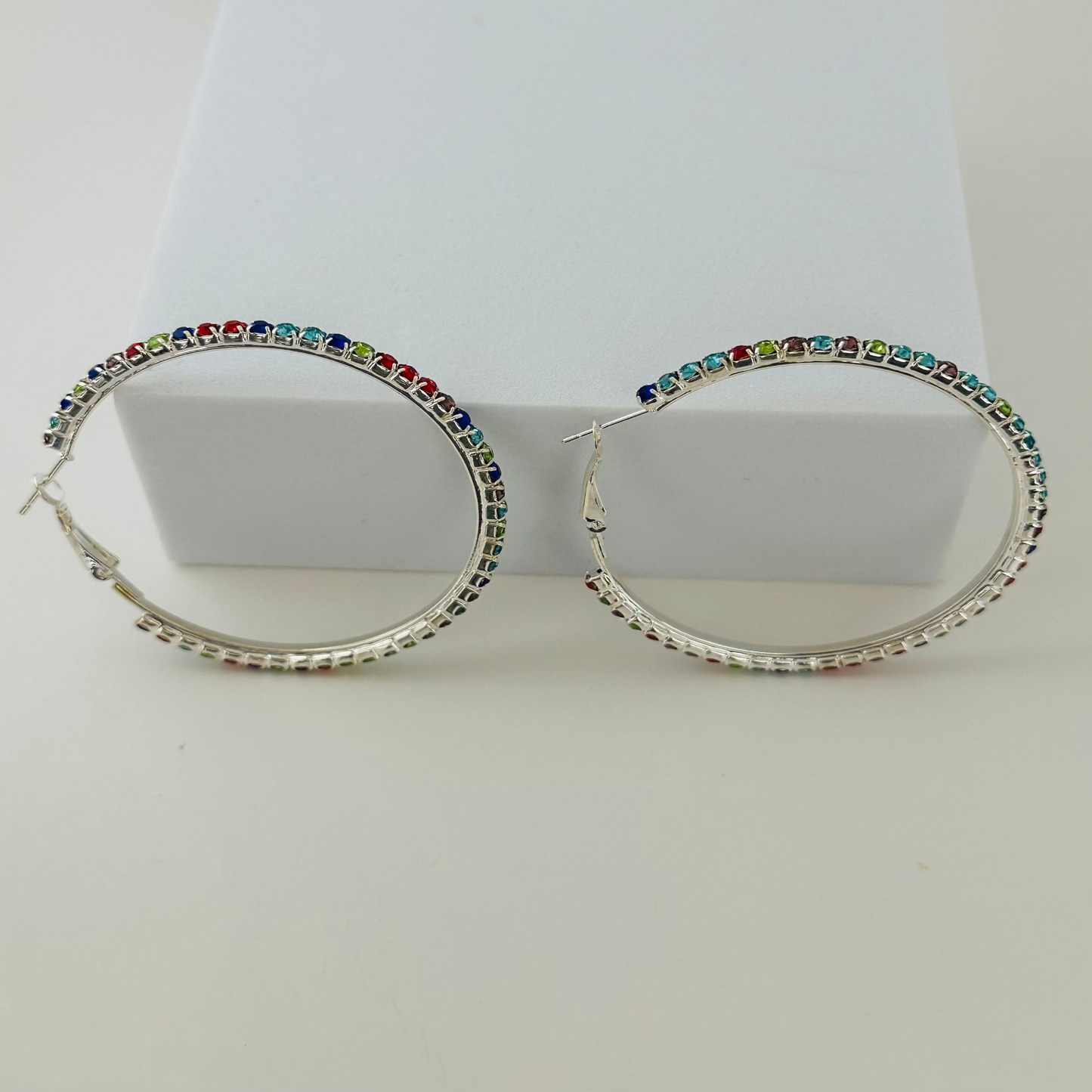 Silver colorful rhinestones hoop earring 2.9 Inches diameter 
0.41 oz.