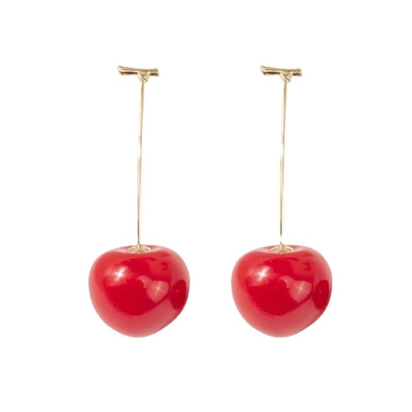 Close-up image of vibrant cherry earrings with red beads and green leaf details, ideal for playful and stylish looks."